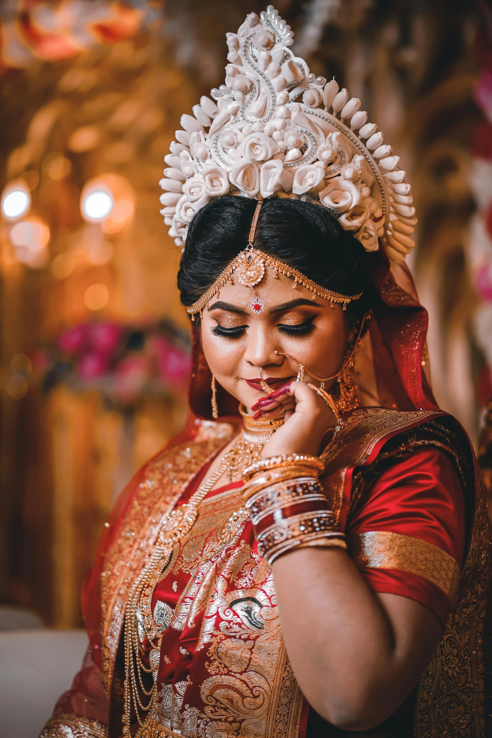 a woman in a red and gold wedding outfit, by Bikash Bhattacharjee, pexels contest winner, hurufiyya, thumbnail, wearing traditional garb, promo image, ornately dressed