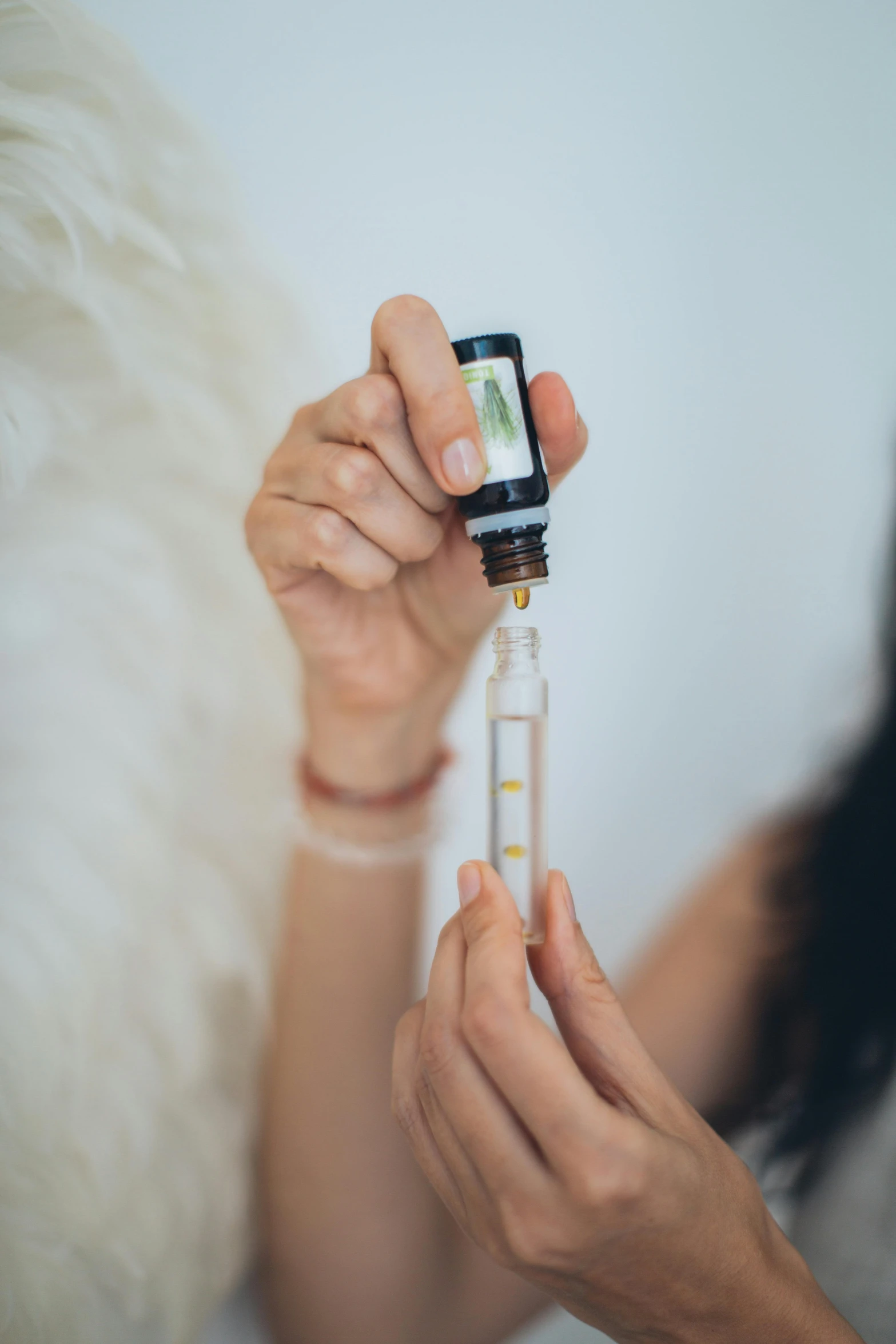 a close up of a person holding a cell phone, holding a syringe, essence, hemp, profile image