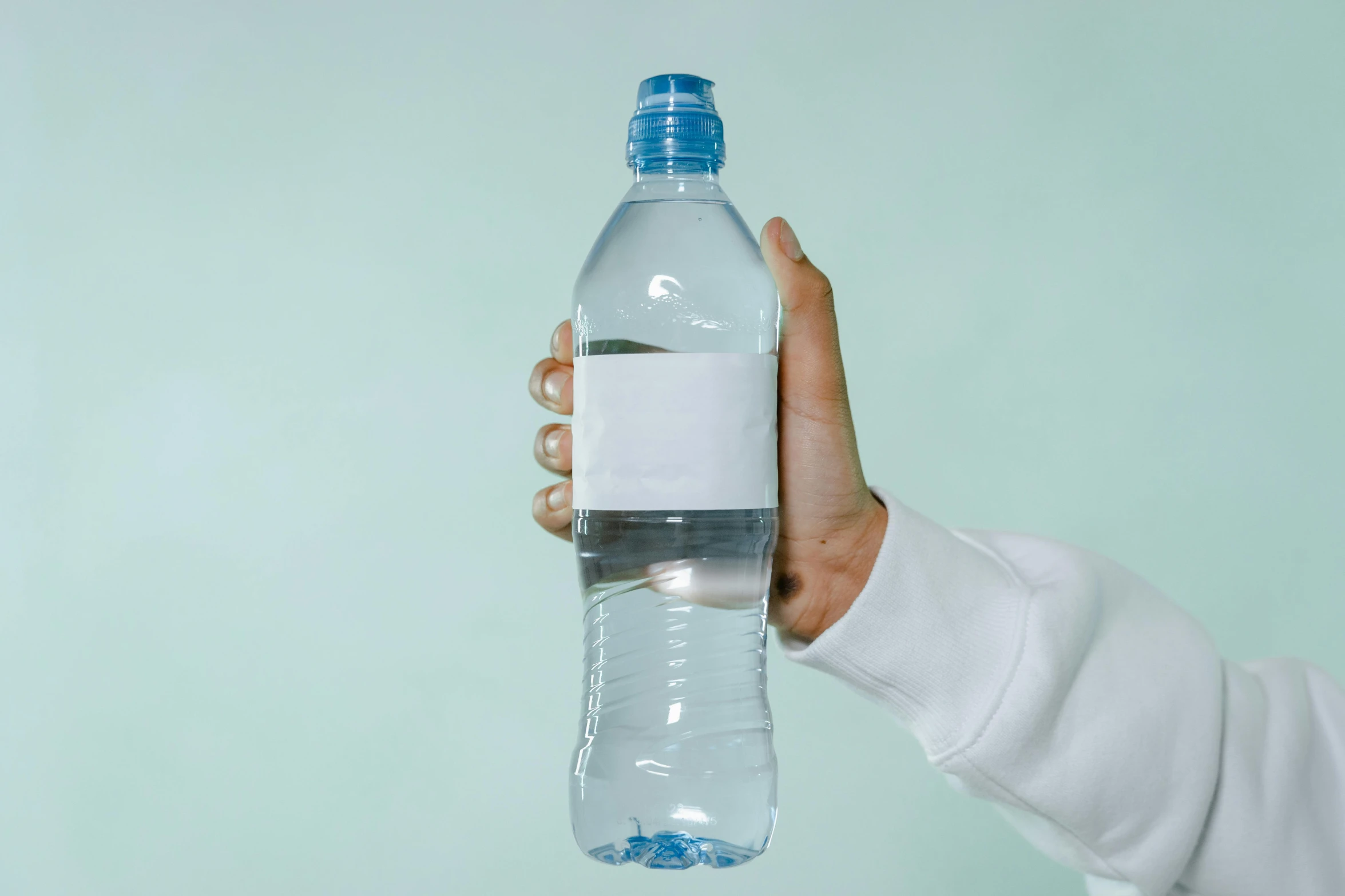 a person holding a bottle of water in their hand, listing image, thumbnail, pack, large