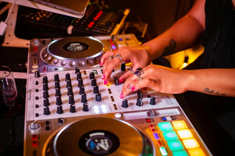 a close up of a person using a dj controller, by Julia Pishtar, vip room, avatar image, birdseye view, thumbnail