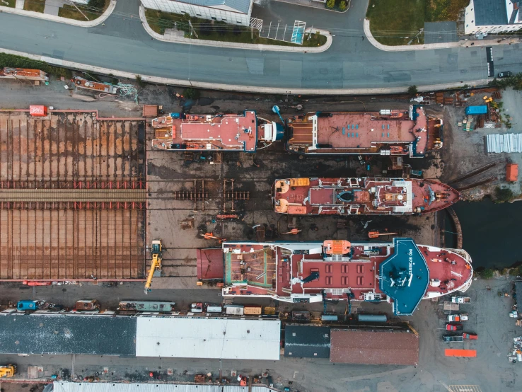 a large boat sitting on top of a body of water, happening, shipyard, flatlay, stacked image, parking lot