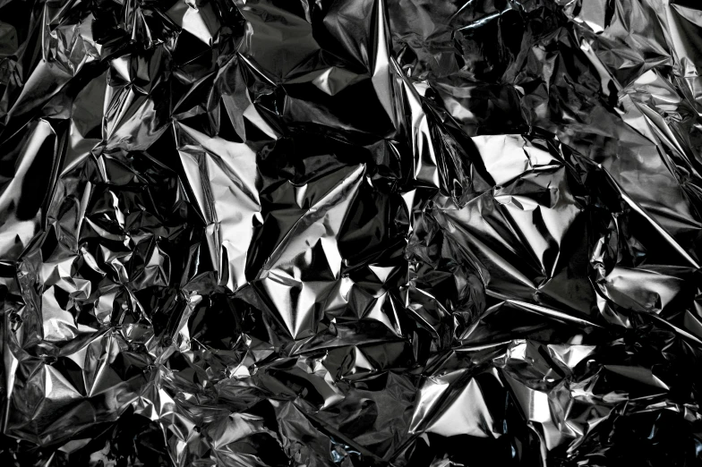 a black and white photo of tin foil, by Patrick Pietropoli, pexels, conceptual art, 15081959 21121991 01012000 4k, black main color, high detailed illustration, glossy plastic