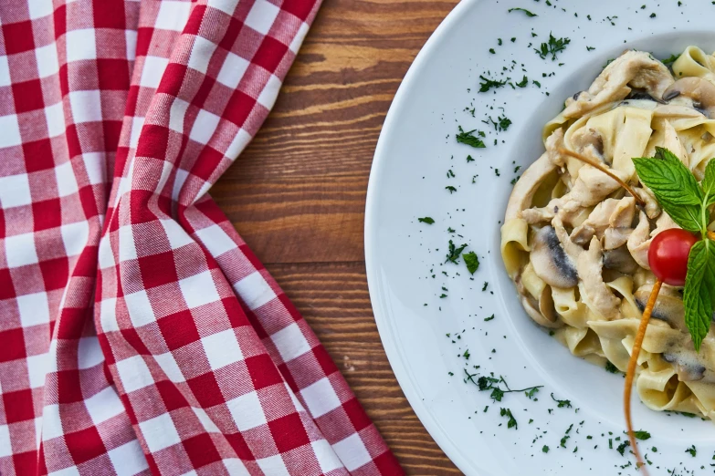 a close up of a plate of food on a table, pexels contest winner, pasta, ecru cloth, square, thumbnail