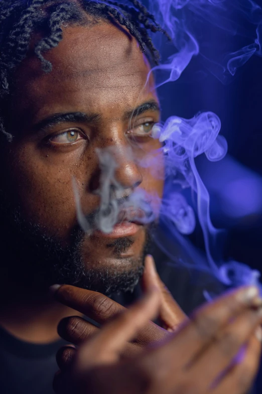 a close up of a person smoking a cigarette, an album cover, high blue lights, nas, 2019 trending photo, scruffy man