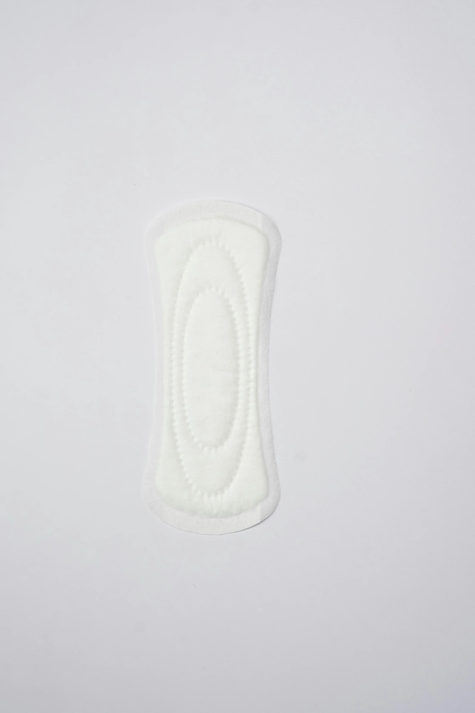 a close up of a white object on a white surface, contracept, large white border, product shot, large tall