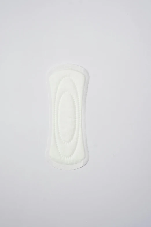 a close up of a white object on a white surface, contracept, large white border, product shot, large tall