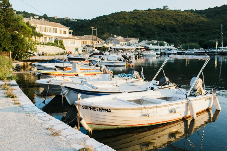 a number of boats in a body of water, by Anita Malfatti, pexels contest winner, renaissance, greek nose, late summer evening, small port village, edouard caplain