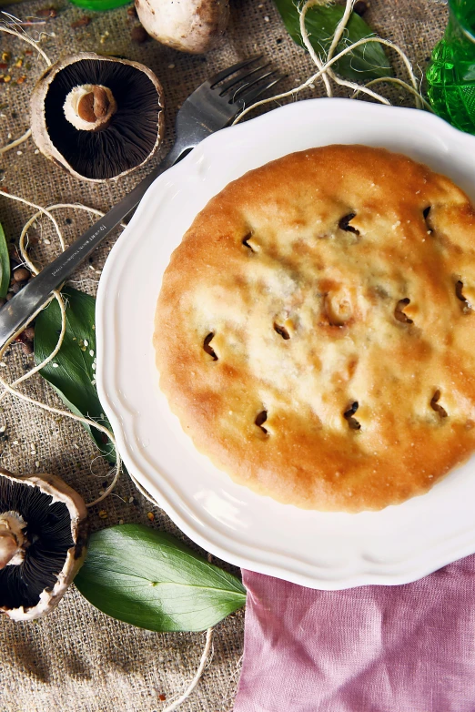 a close up of a plate of food on a table, inspired by Romano Vio, reddit, hurufiyya, pastry, made of mushrooms, gorget, retro style ”