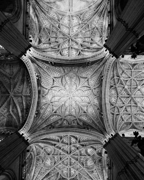 a black and white photo of a ceiling, by Niklaus Manuel, very detailed medieval, seville, photographic isometric cathedral, archs