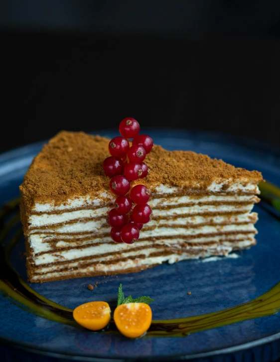 a piece of cake sitting on top of a blue plate, peredvishniki, - 9, multiple layers, brown:-2
