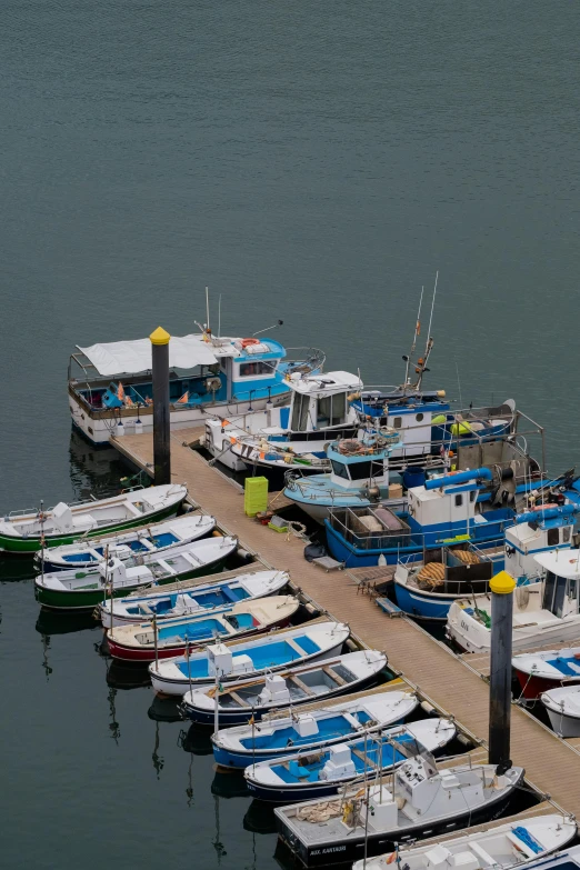 a bunch of boats that are sitting in the water, square, breton cap, top - down photograph, david a trampier