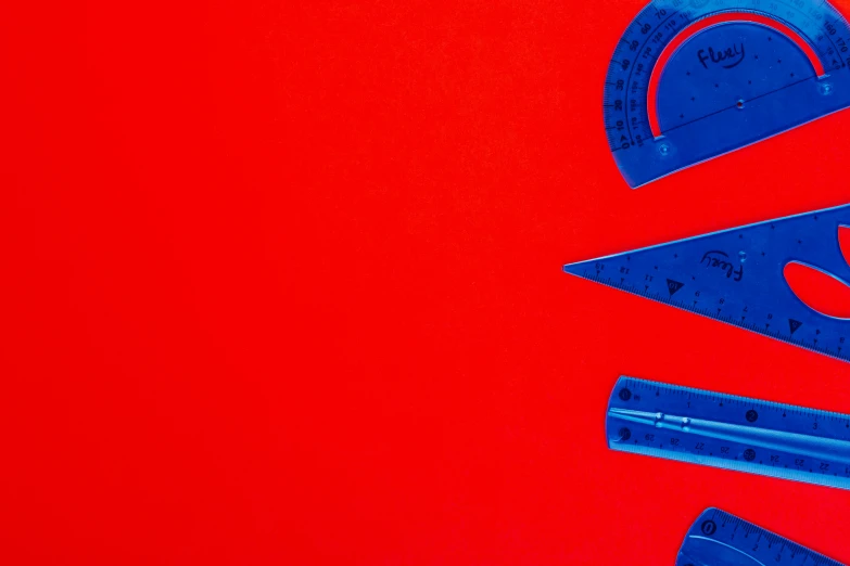 a group of blue rulers sitting on top of a red surface, behance, constructivism, intricate mathematical shape, featured art, sickle, seen from below