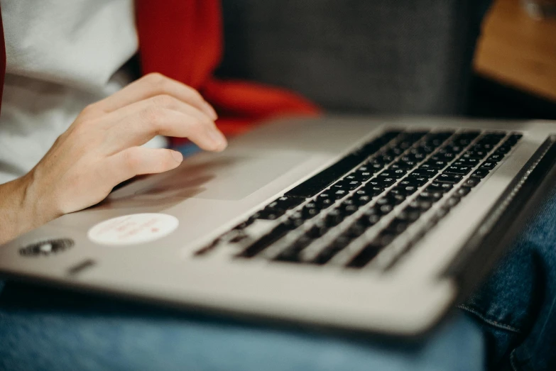 a close up of a person typing on a laptop, by Carey Morris, trending on pexels, avatar image, student, background image