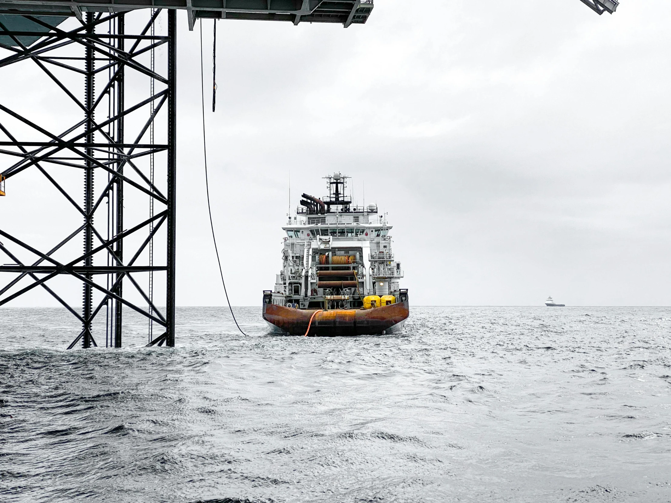 a large boat in the middle of a body of water, worksafe. instagram photo, deepsea, construction, in scotland