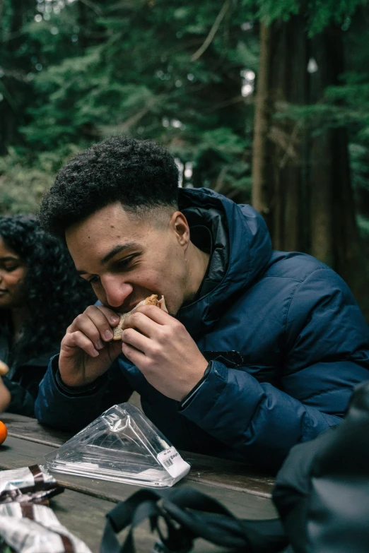 a group of people sitting at a picnic table, a portrait, pexels contest winner, eating a mushroom, jayson tatum, in a redwood forest, profile image