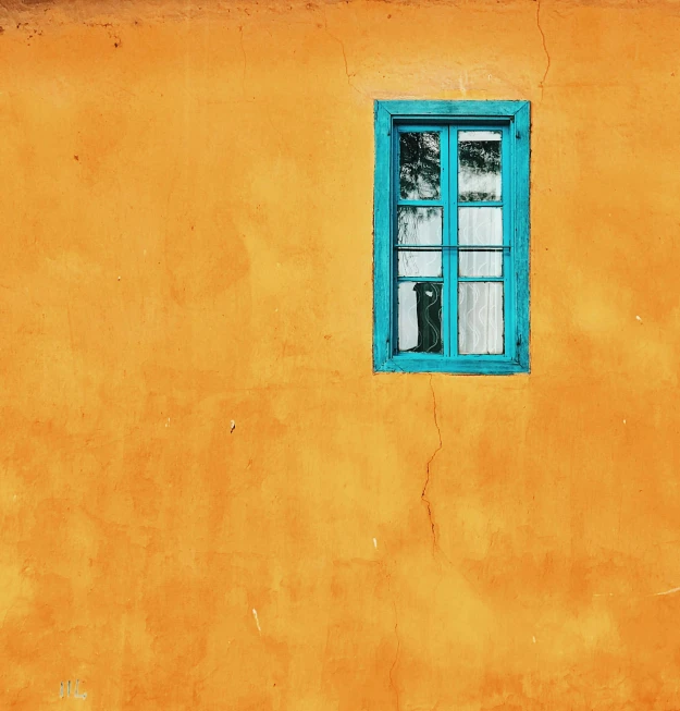 a yellow building with a blue window and a fire hydrant, a minimalist painting, pexels contest winner, turquoise and orange, photo of a beautiful window, highly textured, 4 k post