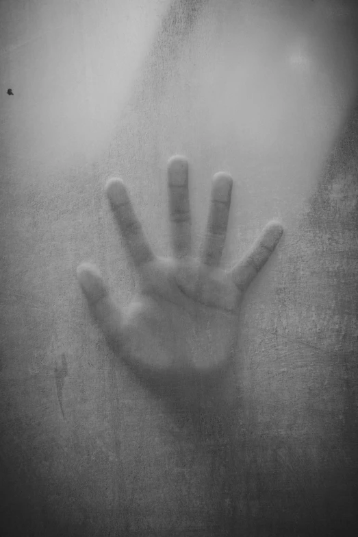 a close up of a person's hand behind a glass, a black and white photo, inspired by Katia Chausheva, flickr, hand with five fingers, jump scare, :: morning, hand carved