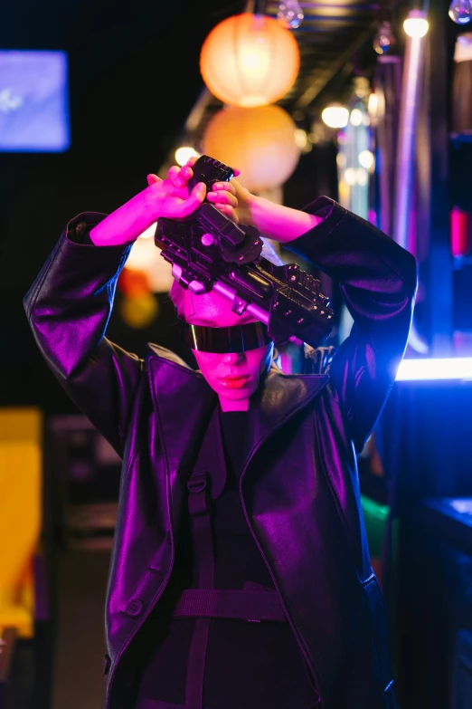 a woman in a purple jacket holding a gun, a hologram, pexels, interactive art, wearing shiny black goggles, discovery zone, boys, cardboard