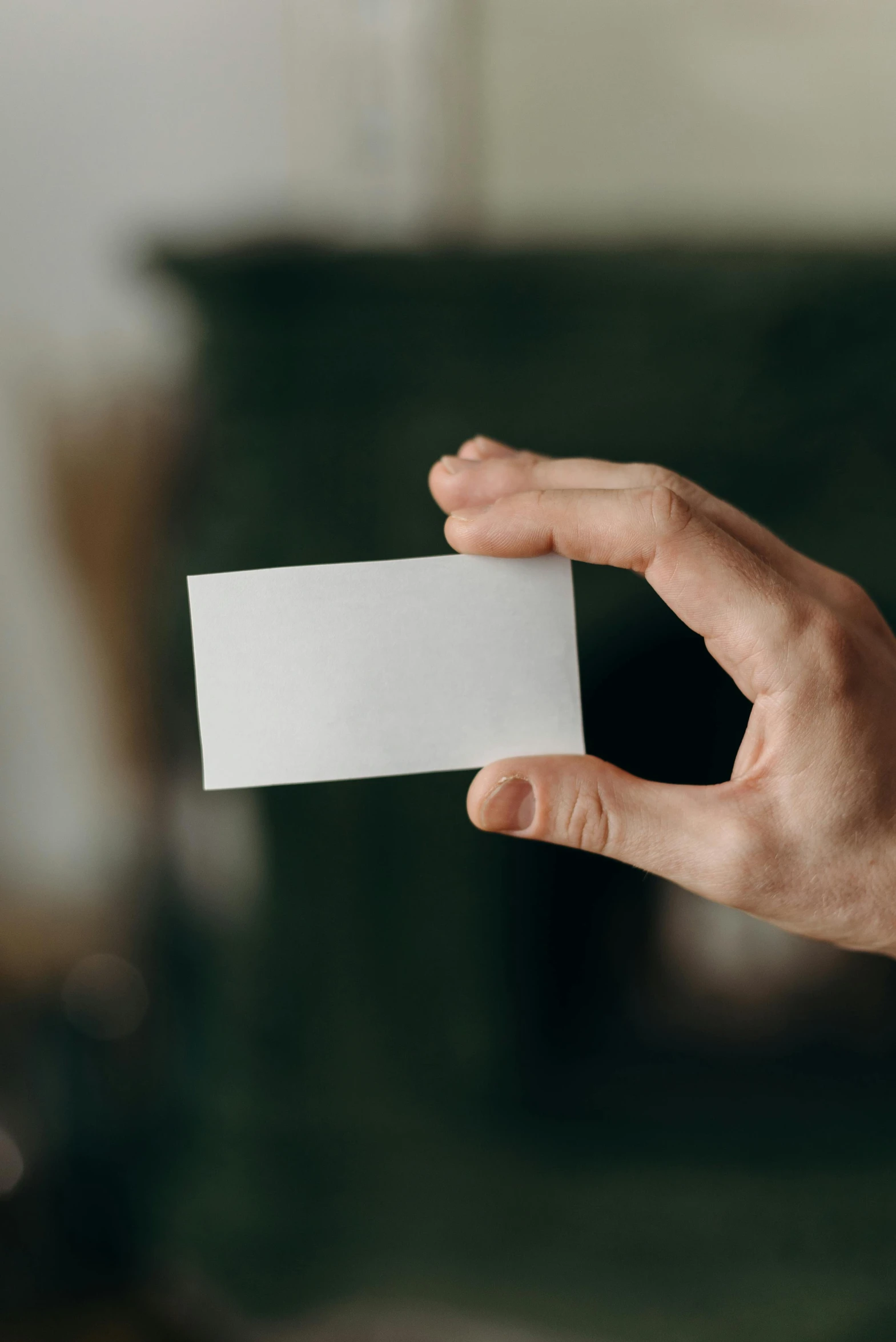 a person holding a business card in their hand, pexels contest winner, made of lab tissue, square, smooth edges, no - text no - logo