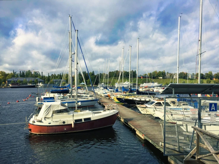 a number of boats in a body of water, espoo, high-quality photo, instagram picture, docked at harbor