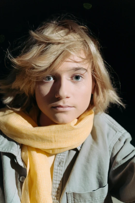 a close up of a person wearing a scarf, by Thomas Bock, blonde boy with yellow eyes, shoulder - length blonde hair, slide show, teenager