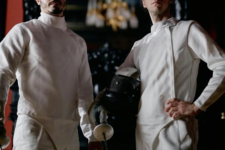 a couple of men standing next to each other, inspired by Horace Vernet, unsplash, renaissance, fencer, white apron, silver，ivory, worksafe. cinematic