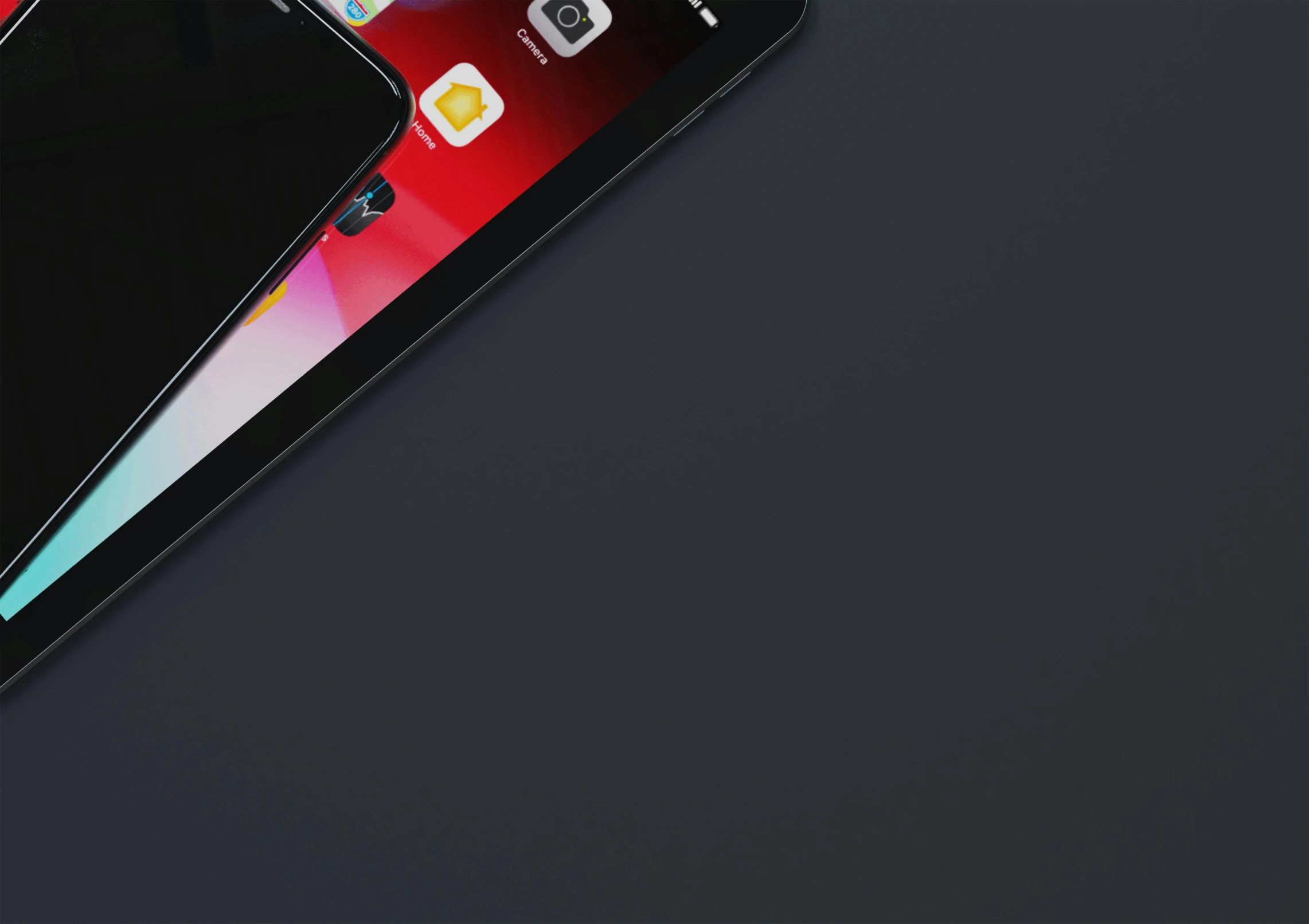 two iphones sitting next to each other on a table, a 3D render, trending on pexels, red on black, ipad pro, close up shot from the top, desaturated blue