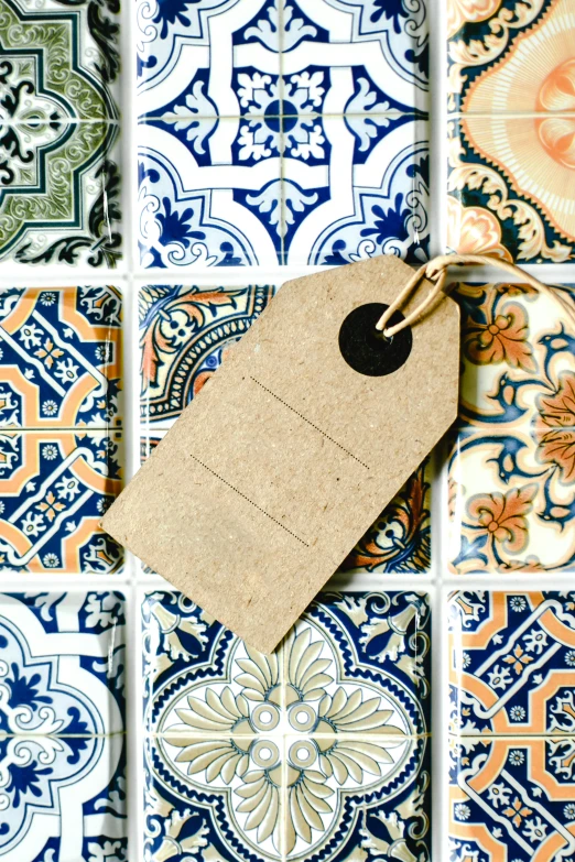 a bunch of different colored tiles with a price tag, unsplash, arts and crafts movement, square, spanish, premium quality, indigo