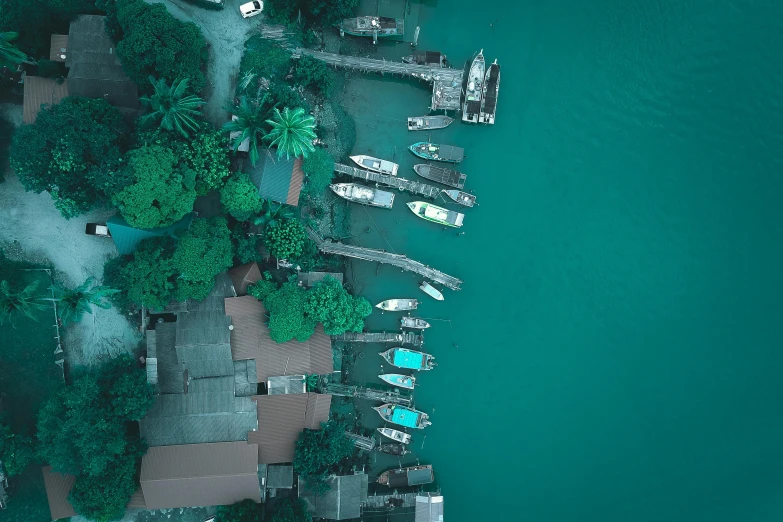 a group of boats sitting on top of a body of water, pexels contest winner, hurufiyya, teal skin, neighborhood, v - ray collection, birdeye