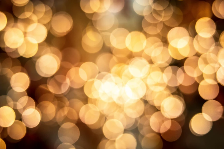 a close up of a bunch of lights, by Josh Bayer, pexels, gold dappled light, instagram post, light circles, holiday season