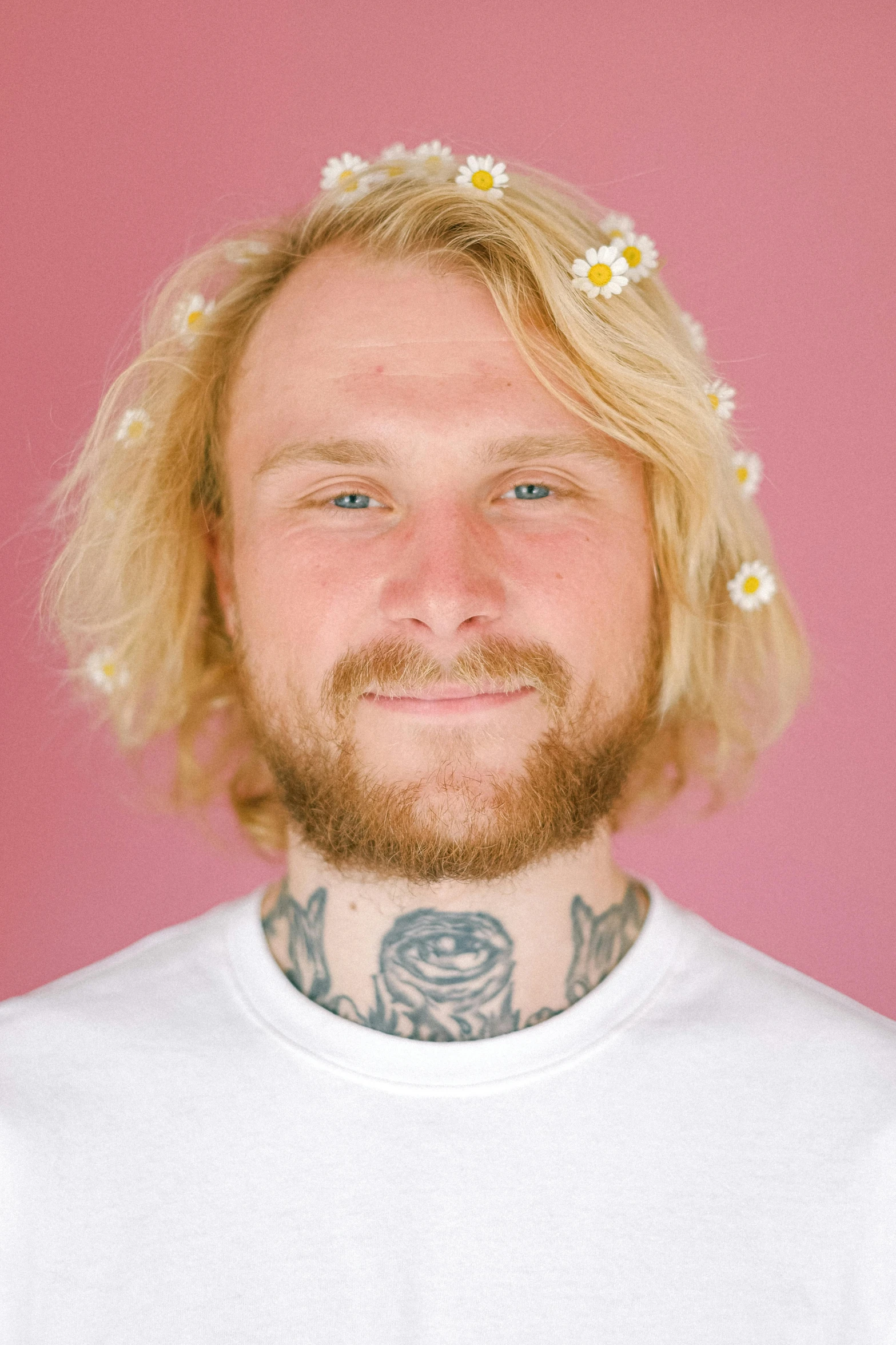 a man with a flower crown on his head, inspired by Seb McKinnon, featured on reddit, aestheticism, small blond goatee, color corrected, body and headshot, press shot