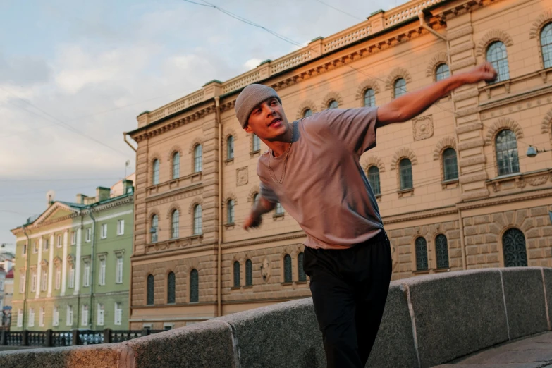 a man riding a skateboard down the side of a road, by Anna Füssli, happening, saint petersburg, parkour, standing in a city center, basil gogos