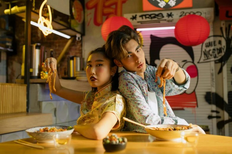 a couple of people that are sitting at a table, trending on pexels, cai xukun, big trouble in little china, ready to eat, lights on