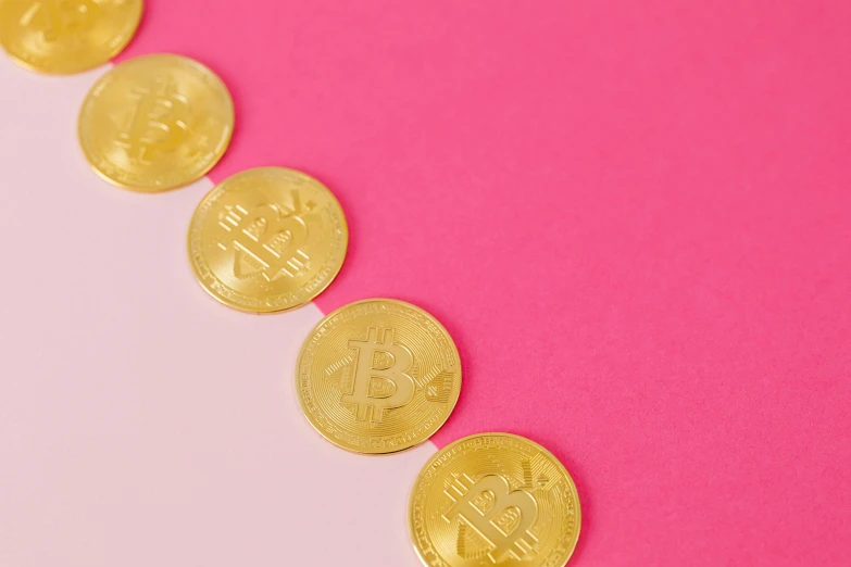 a row of gold bitcoins on a pink background, by Julia Pishtar, trending on pexels, pop art, made of money, instagram post, golden ration, taken from the high street
