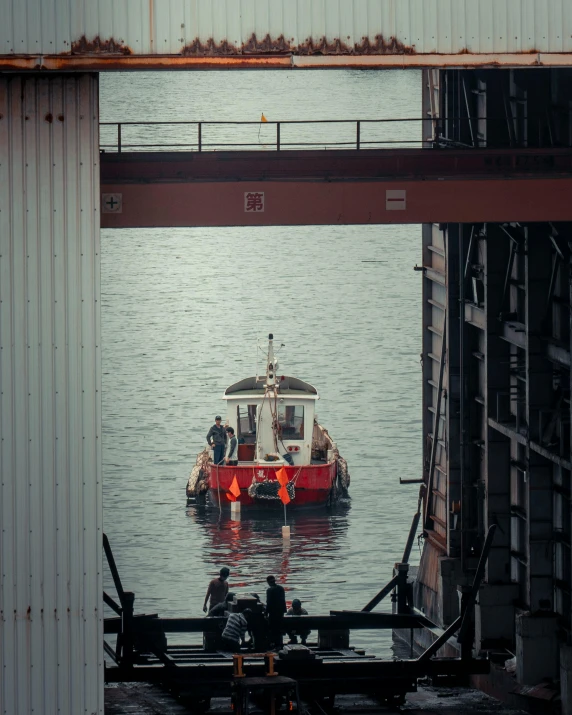 a red and white boat in a body of water, industrial party, unsplash photo contest winner, instagram story, people at work