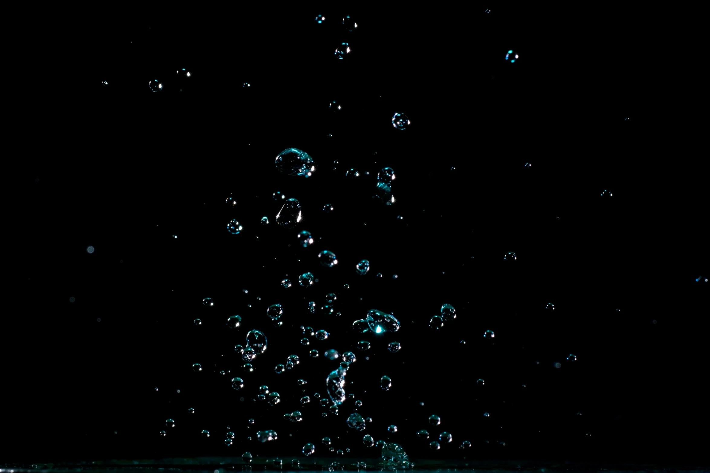 a close up of water with bubbles coming out of it, an album cover, black background, ffffound, [ bubbles, pitch black background