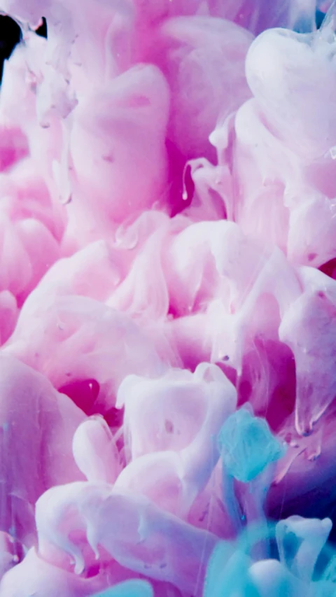 a close up of a pink and blue substance, inspired by Lynda Benglis, unsplash, bubble bath, made of wax and water, cake, liquid clouds