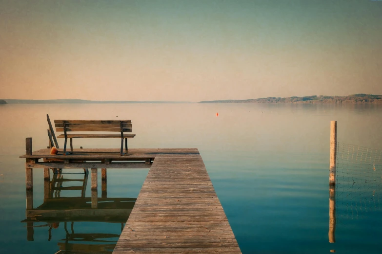 a bench sitting on top of a wooden dock, a minimalist painting, pexels contest winner, romanticism, vintage muted colors, the dead sea, calm evening, lake blue