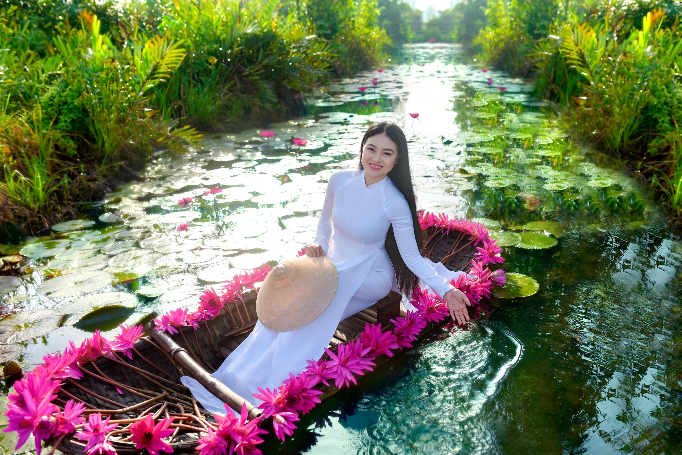 a woman sitting in a boat on a body of water, an album cover, inspired by Cui Bai, pexels contest winner, ao dai, lush oasis, white, avatar image