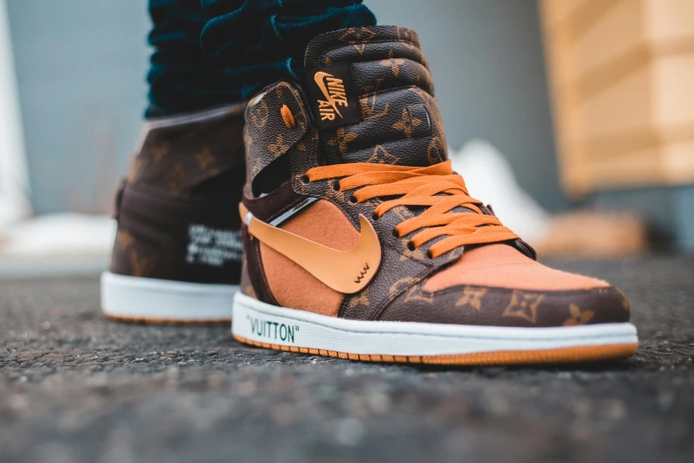 a pair of shoes that are on the ground, inspired by Jordan Grimmer, trending on pexels, graffiti, heron preston, “air jordan 1, brown, ultra high detailed