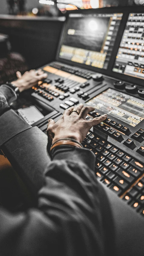 a man using a mixing console in a recording studio, by Matthias Stom, trending on unsplash, video art, cinematic outfit photo, view from a news truck, thumbnail, avatar image