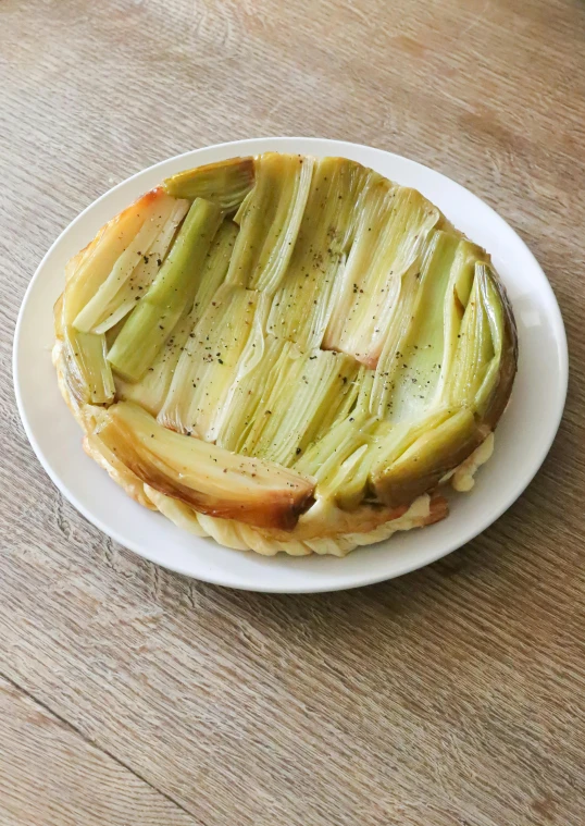 a close up of a plate of food on a table, celery man, flan, 王琛, organic