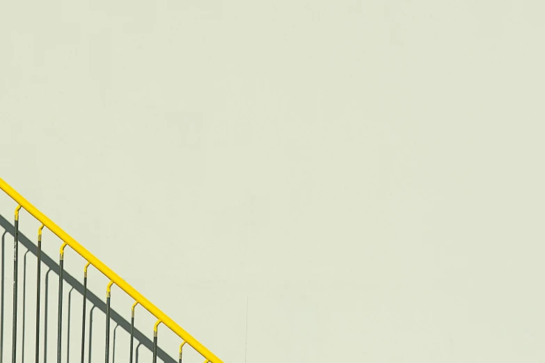 a man flying through the air while riding a skateboard, a minimalist painting, by Werner Gutzeit, unsplash, postminimalism, 1 staircase, mono-yellow, ( ( railings ) ), banner