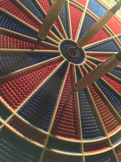 a close up of a dart in a bullseye, kinetic art, 3d printed, intricate 8 k detail, instagram story, red and blue
