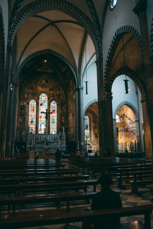 a person sitting on a bench in a church, inspired by Taddeo Gaddi, pexels contest winner, bargello, american gothic interior, gif, on the altar