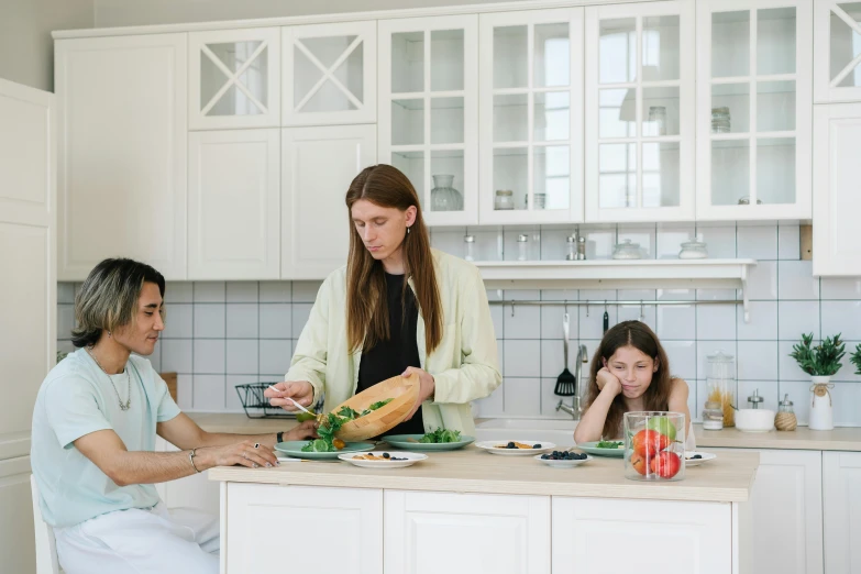 a woman and two children preparing food in a kitchen, pexels contest winner, avatar image, white kitchen table, people sitting at tables, husband wife and son