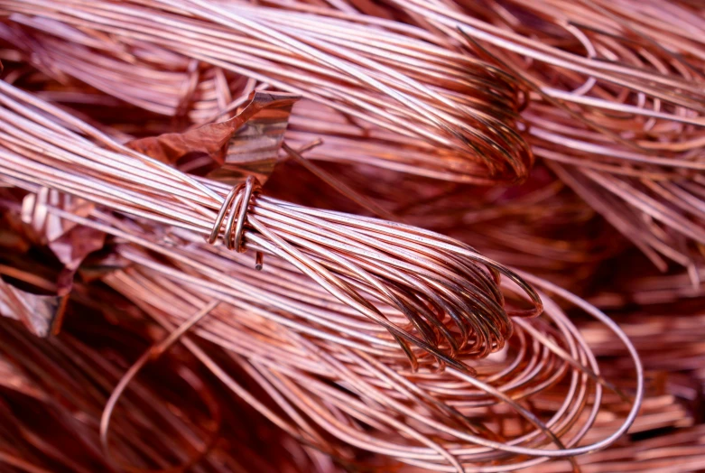 a pile of copper wire sitting on top of a table, pexels, happening, metallic flecks, red wires wrap around, panels, promo image