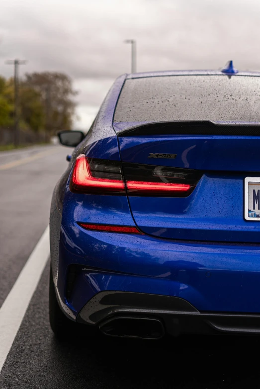 a blue car parked on the side of the road, tail lights, thumbnail, f / 3 2, hyperdetalied