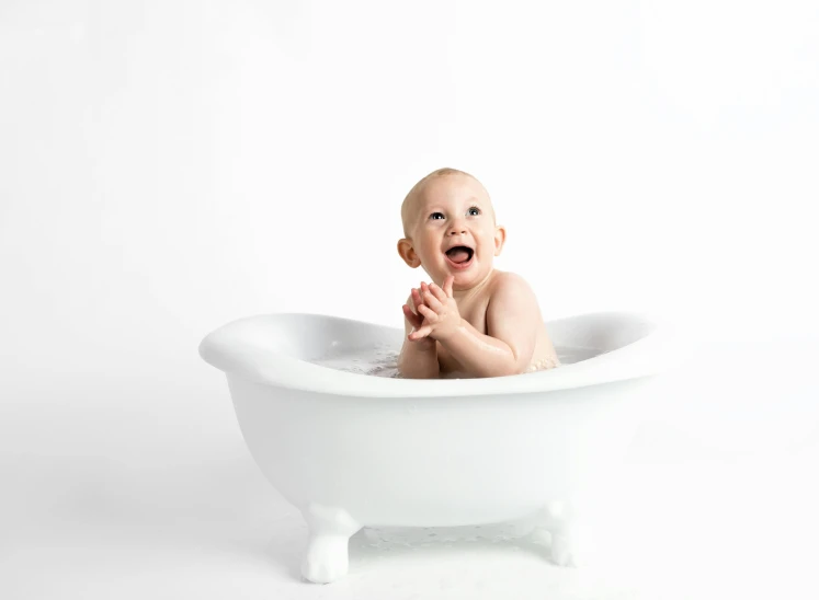 a baby sitting in a bathtub laughing, pexels, process art, high quality topical render, white, professionally post-processed, product introduction photo