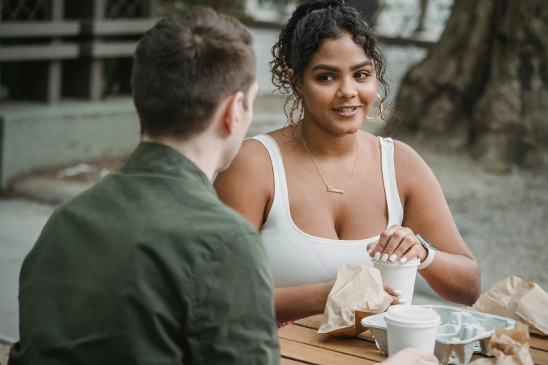 a man and a woman sitting at a table, trending on pexels, sydney park, plus-sized, upper body image, mid 2 0's female